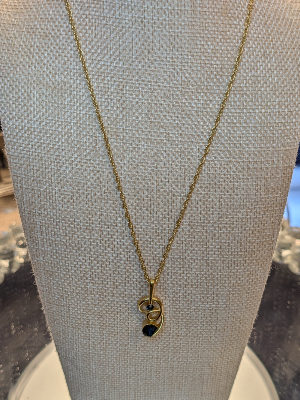 Nina Ricci Gold Plated Swirl Pendant Necklace with Blue Swarovski Crystals NWT